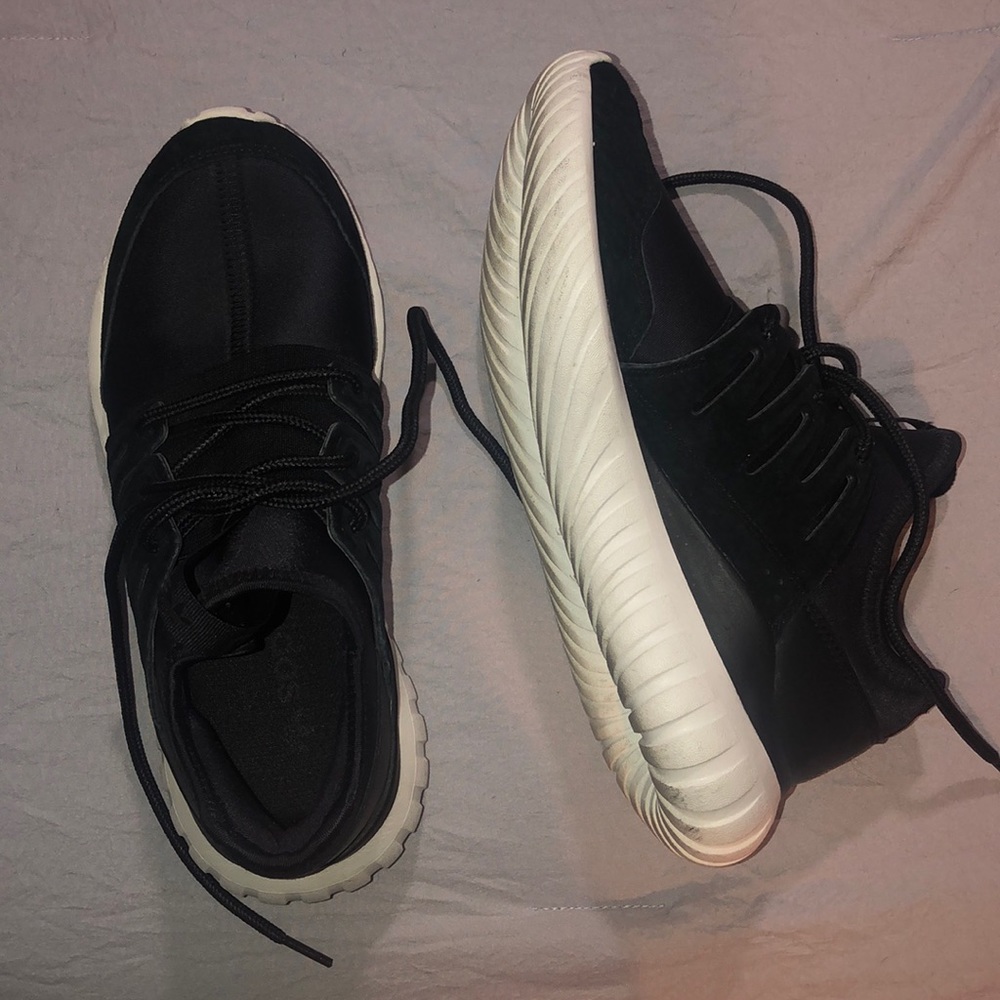 All black adidas tubulars